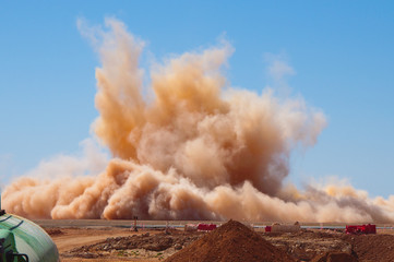 Blasting dust and clouds