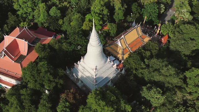 Aerial drone view circling around a Wat in Phnom Penh, Cambodia. Phnom Penh is the original founding location of the city of Phnom Penh.