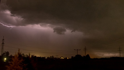 Obraz premium Thunderstorm with lightning near Aholming - Bavaria - Germany