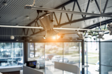 Spotlight hang from the ceiling in the exhibition hall