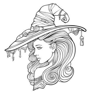 Beautiful witch in a hat