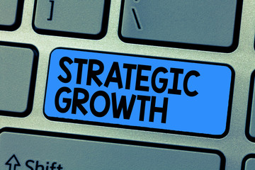 Text sign showing Strategic Growth. Conceptual photo create plan or schedule to increase stocks or improvement.