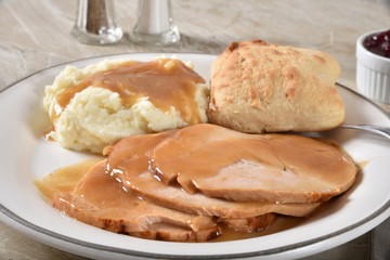 Turkey dinner with mashed potatoes and gravy