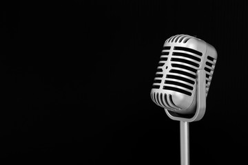 Retro microphone on a black background