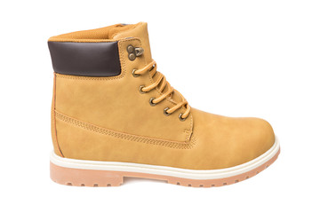 male pastel yellow boots, winter sports shoes, on a white background, isolate
