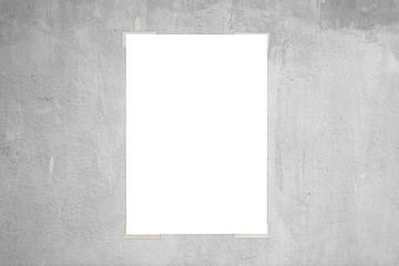 White paper sticked on gray wall