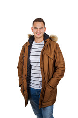 Young man wearing winter parka jacket © Ocskay Mark