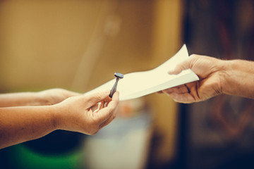 Person receives the stamp at a polling station