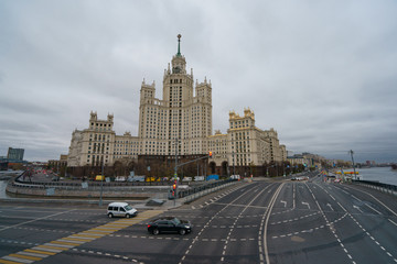 Fototapeta na wymiar Moscow city image at the cloudy autumn day. The Stalin era house is very massive building