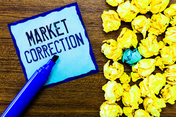 Writing note showing Market Correction. Business photo showcasing When prices fall 10 percent from the 52 week high.