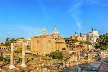 Fototapeta na wymiar The Curia Julia, the Temple of Peace, Santi Luca e Martina Church in the Roma Forum