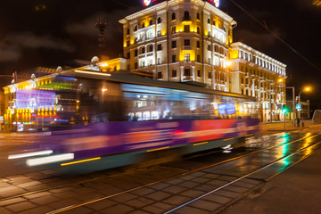 Fototapeta na wymiar The motion blurred tram in the evening.