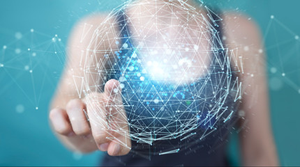Businesswoman using digital triangle exploding sphere hologram 3D rendering