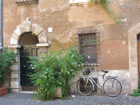 bicycle in front of old house