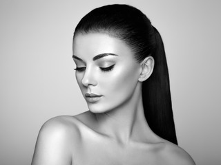 Beautiful Young Woman with Clean Fresh Skin. Perfect Makeup. Beauty Fashion. Eyelashes. Cosmetic Eyeshadow. Highlighting. Cosmetology, Beauty and Spa