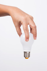 Hand Holding Light Bulb