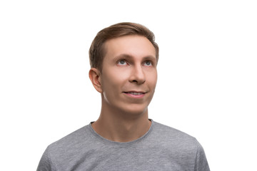Fair male in simple gray t-shirt isolated portrait