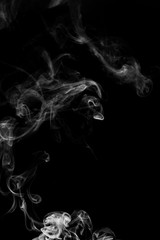 abstract white smoke in the air on a black background
