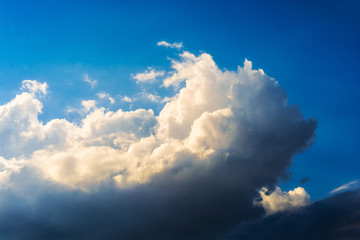 Naklejka premium Dark storm clouds in the sky. Blurring background. Bright colors.
