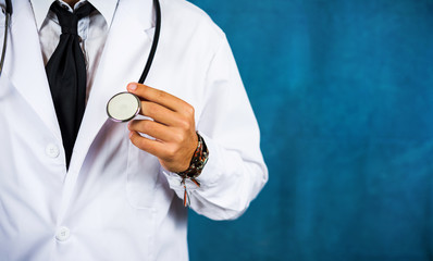 Torso of a confident doctor with stethoscope