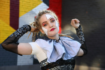 Portrait of a girl clown outdoors