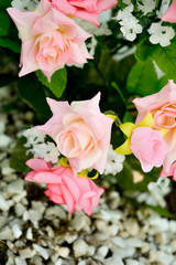 Obraz premium Close up of artificial rose flower bouquet. Silk flowers