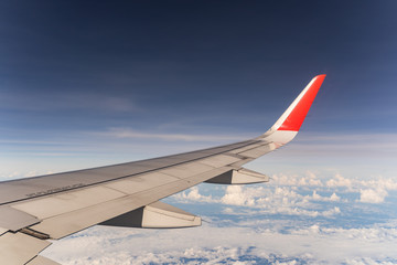 Obraz premium Beautiful view from airplane window and blue sky on nice sunny day, This time in altitude during flight.