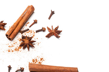 Cinnamon sticks and star anise isolated on white background