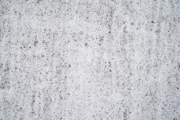 weathered wall grunge background, white plaster with black distressed texture