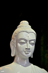 White alabaster buddha head
