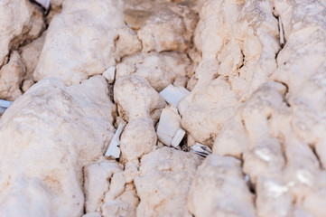Letters to God shoved between the stones on Western Wall