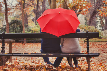 love, happy elderly couple in love, retired people enjoying romantic moment in autumn park, fall...