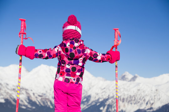 little girl  in ski resort