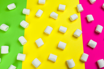 Fototapeta na wymiar minimal sweet marshmallow on color background