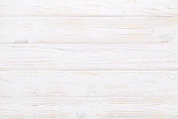 White plank texture of old wood table. Rustic aged wooden background.