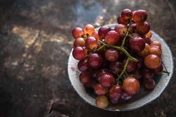 Vietnamese grape on rustic background