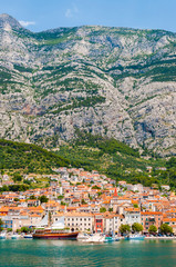 Naklejka premium Classical tourist sailing yacht in the bay of Makarska, Croatia
