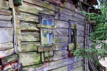 Boarded up windows of abandoned rural house