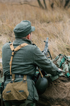 German Wehrmacht soldier in position with a machine gun