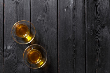 two mugs of green tea. top view.