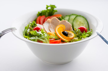 Decorated food. Vegetable salad with turkey