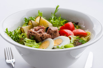 Tuna salad with eggs and vegetables.