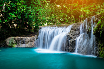 Erawan waterfall at tropical forest of national park, Thailand 