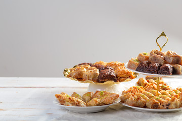 Assorted baklava- A Turkish sweet arranged on a decorative plate. Middle eastern food photography.