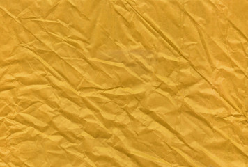 Christmas golden crumpled and grungy textured blank paper background