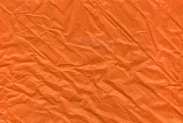 Halloween orange crumpled and grungy textured blank paper background