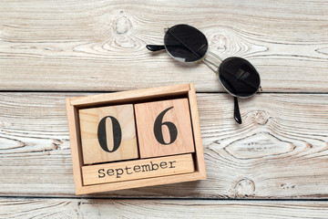 September 6. Image of September 6 wooden calendar on wooden background . Autumn day