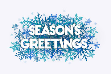 Season's Greetings concept with snowflakes in the background. Decorative design with snow burst.  © lvnl