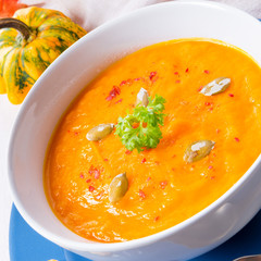 healthy pumpkin soup with ginger carrots and coconut milk