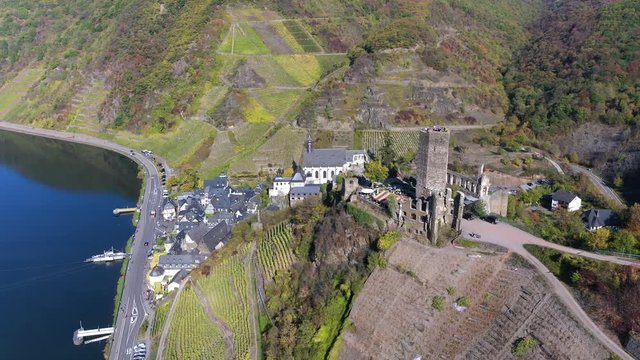 Aerial view of vineyards in autumn near Polterndorf with Metternich castle, Moselle River